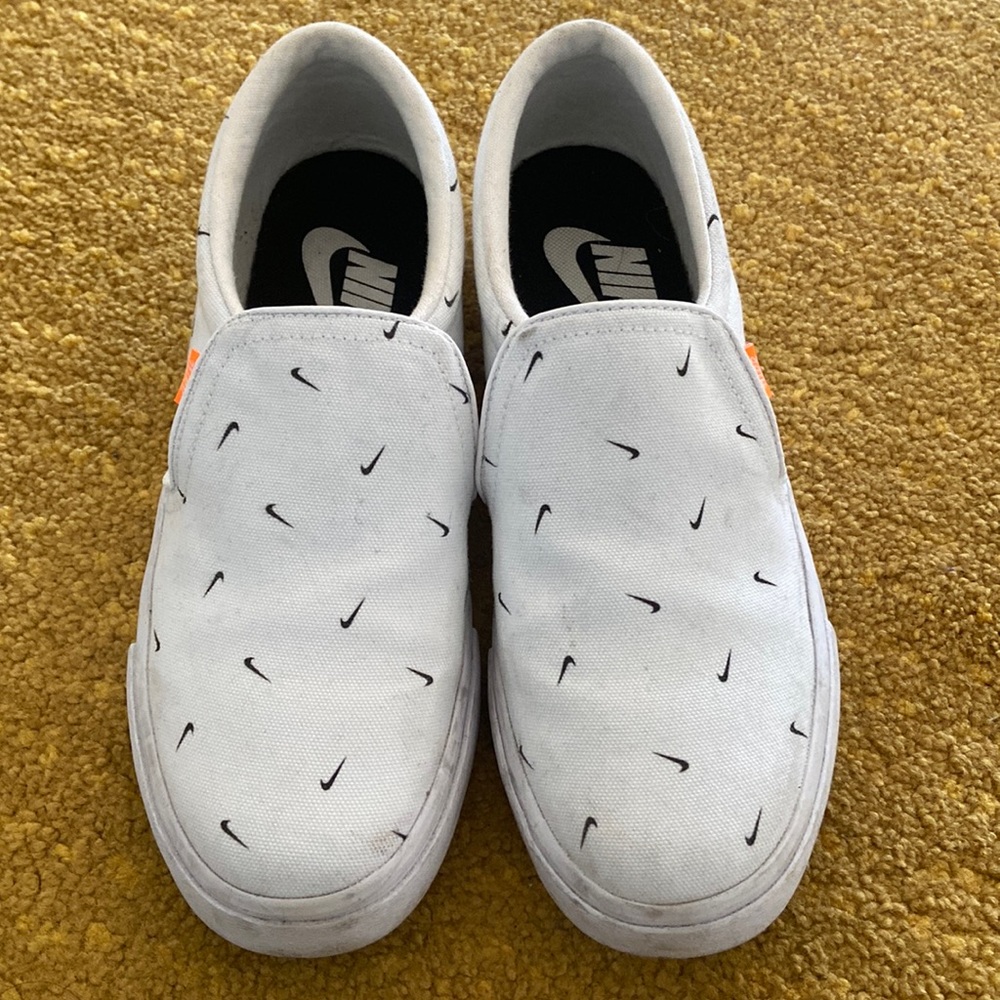 Slip on Nike sneakers.